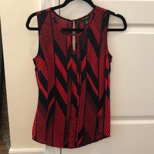 Red and black sleeveless blouse
